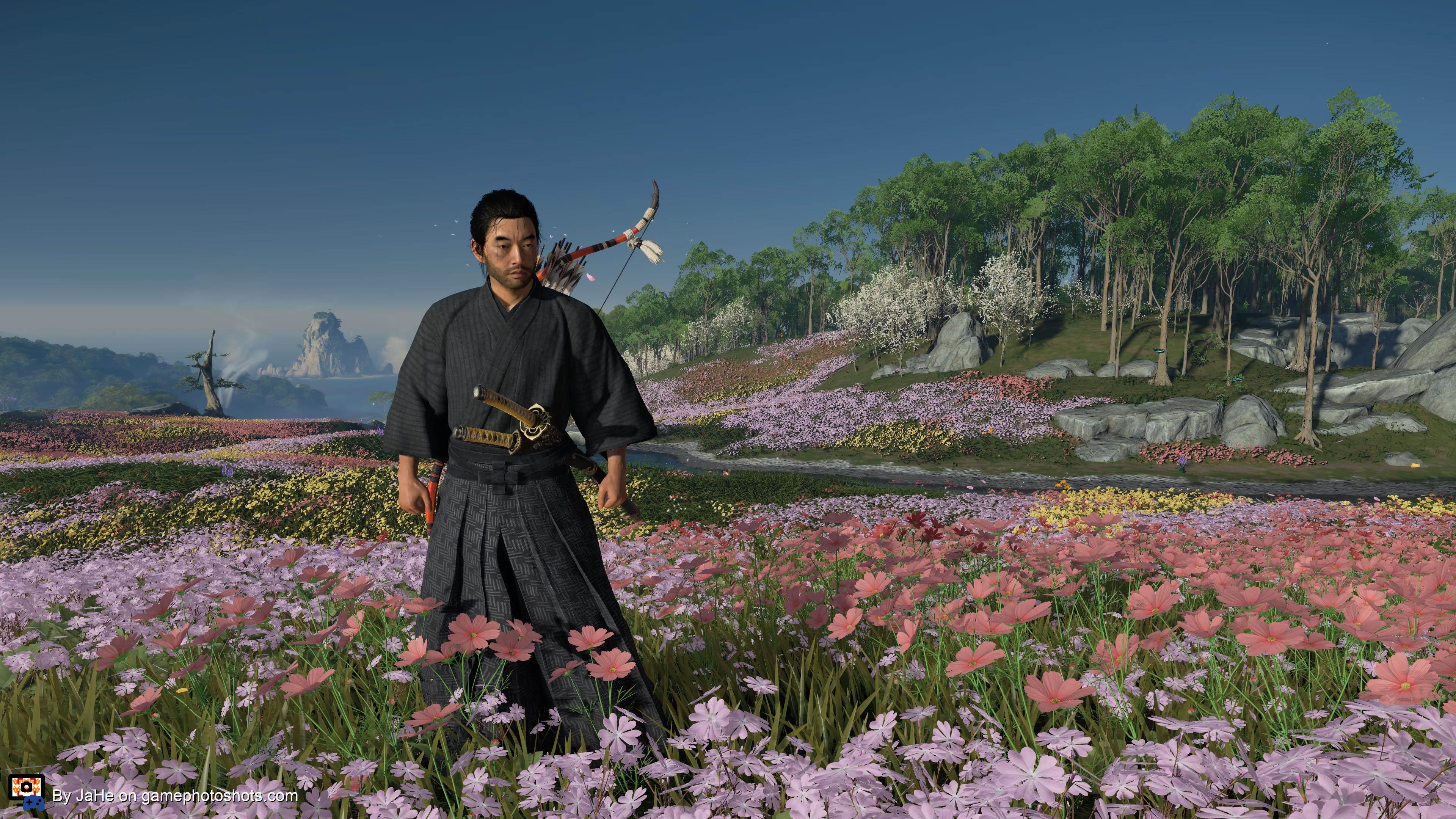 Jin Sakai in field of flowers 