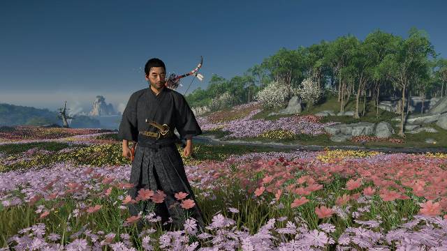 Jin Sakai in field of flowers 